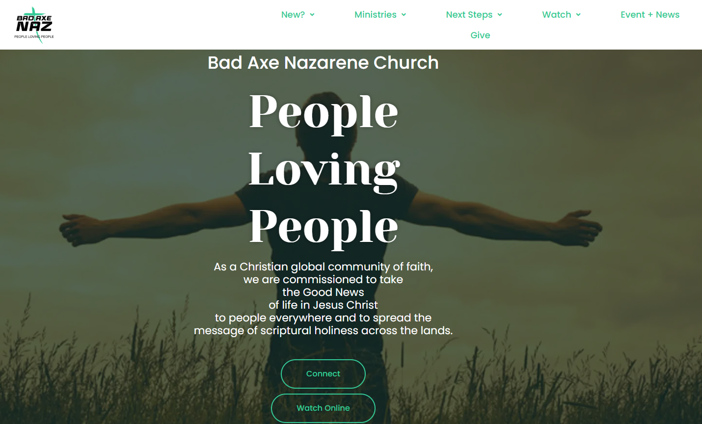 Person with outstretched arms in a natural setting, representing community and faith, aligned with Bad Axe Nazarene Church's mission of "People Loving People."
