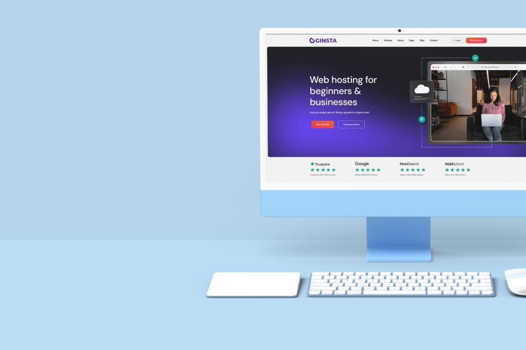 Desktop computer displaying a website for Ginsta, featuring web hosting services for beginners and businesses, with ratings from Trustpilot and Google.
